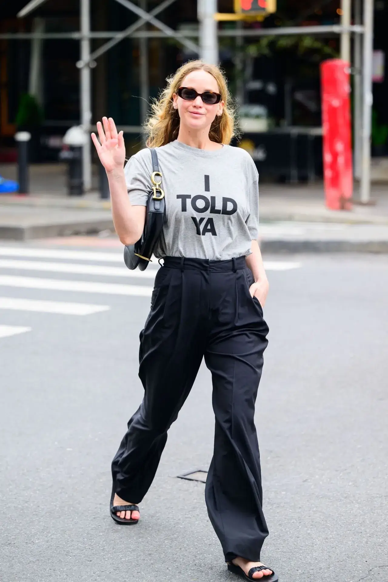 Jennifer Lawrence Stills in Loewe T shirt Black Pant New York City Street